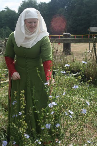 Annisa with flowers small.JPG