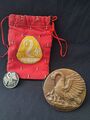 Pelican badge, pouch, and belt buckle
